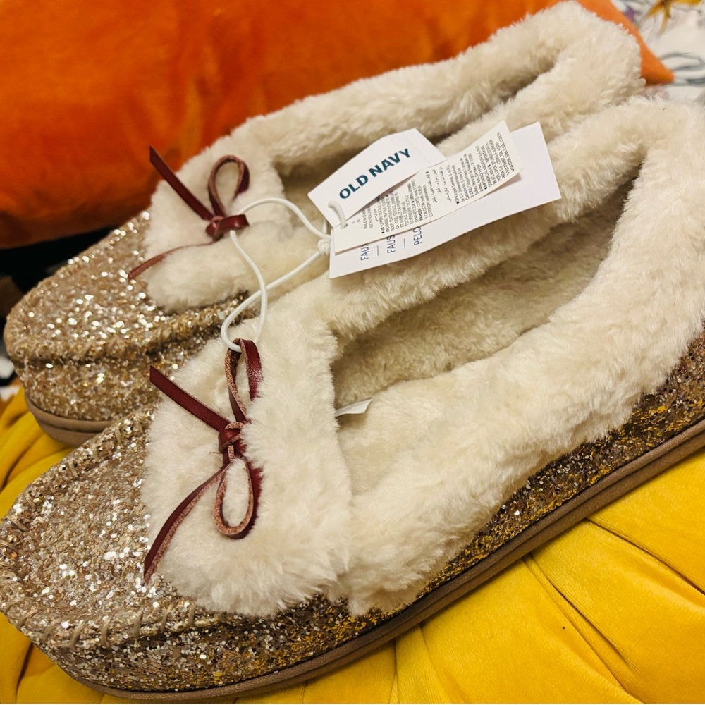 Old Navy moccasins. Size 9 lined w/ fur and gold glitter on outside. New.